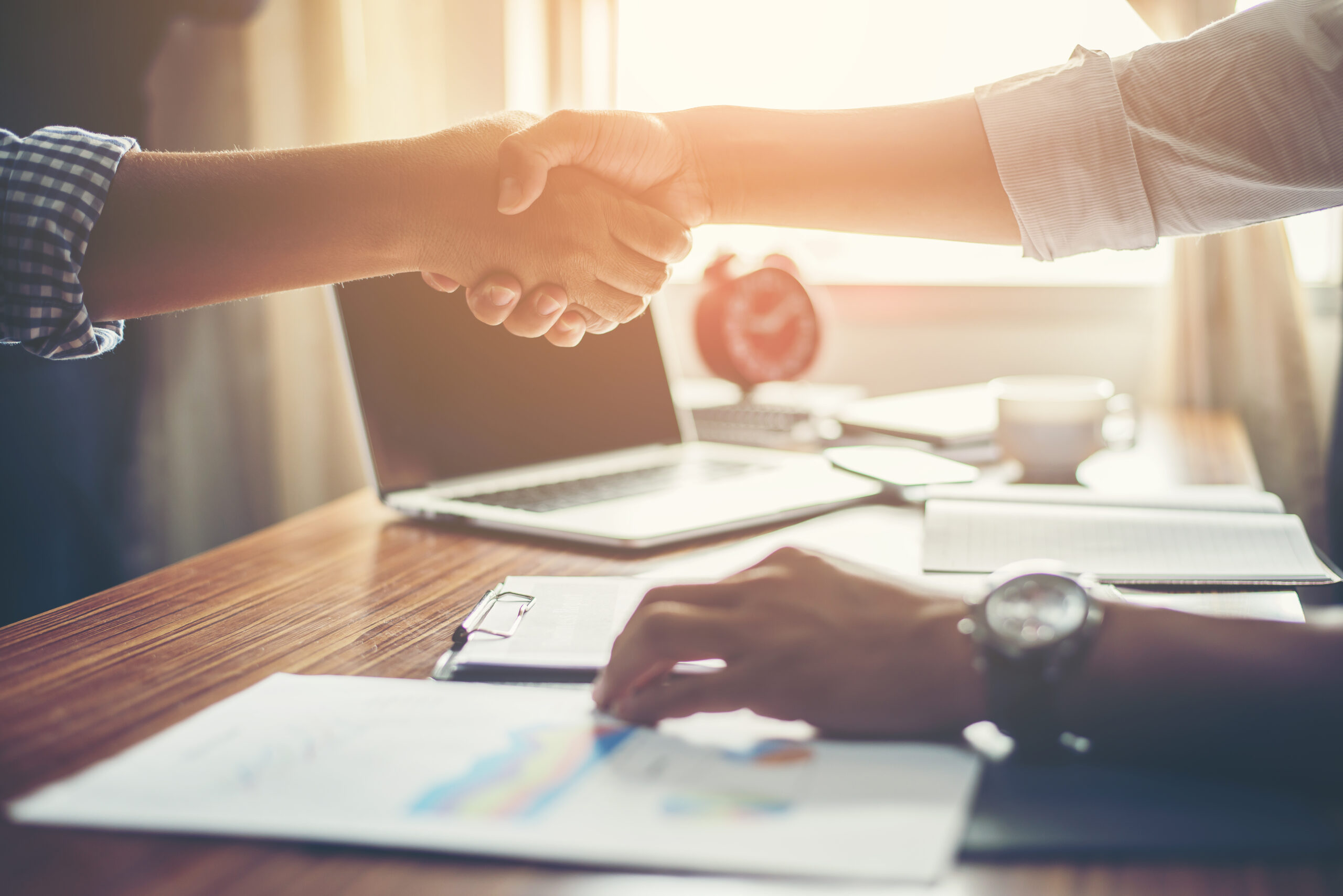 Business people handshake greeting deal at work.
